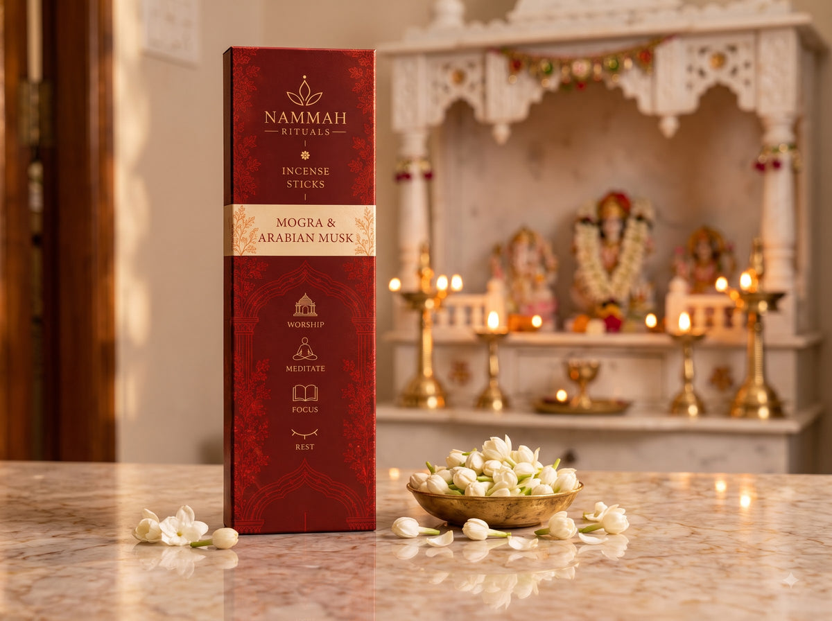 Midnight Jasmine incense box placed near a marble temple altar